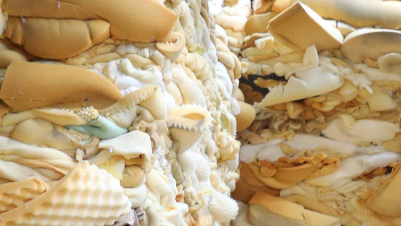 a pile of foam from discarded mattresses