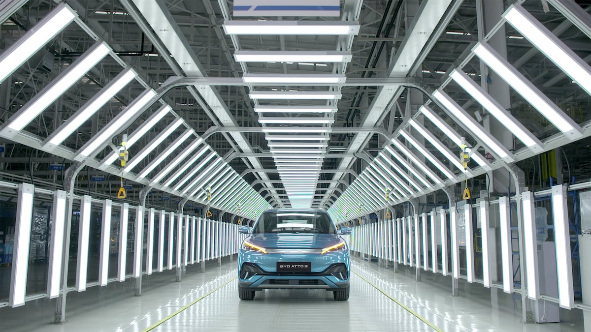 a car in a hi-tech tunnel in a factory