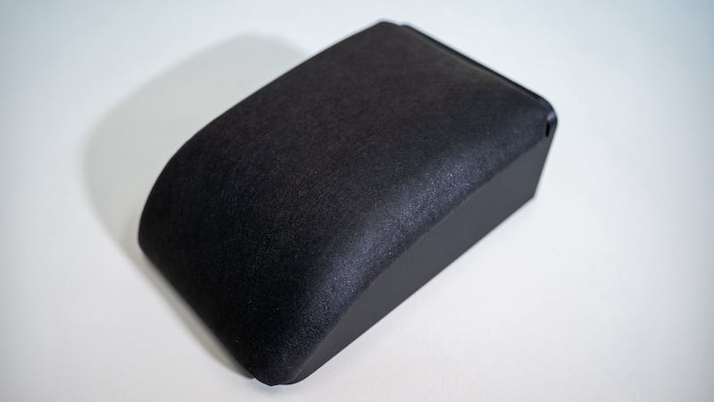 a black car armrest on a grey background